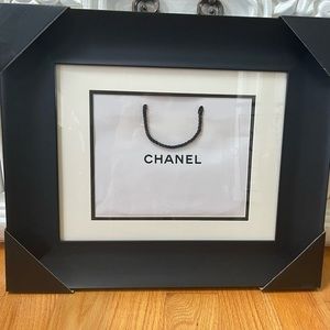 Original 8x10” Chanel bag framed with matting in new 11x14” wide black frame.